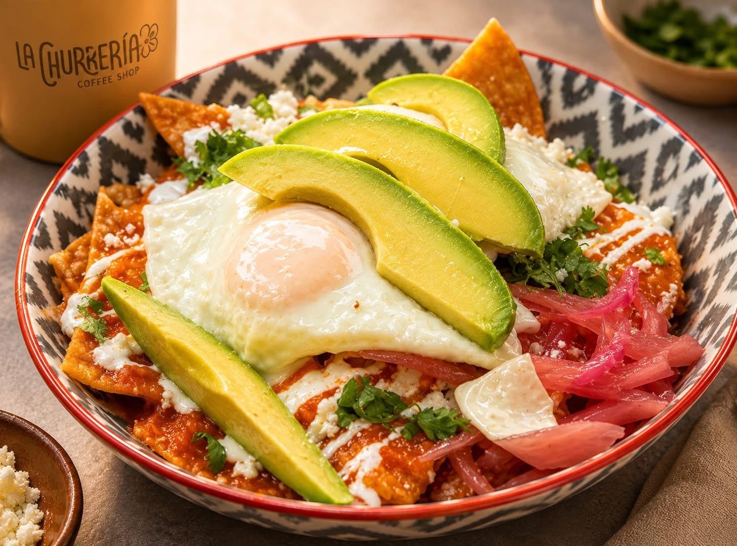 Colorful chilaquiles prepared at La Churrería